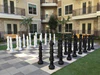 Is the big chess Premium 49-Inch Plastic Giant Chess Set suitable for outdoor use?