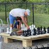 Can the MegaChess 12 Inch Plastic Giant Chess Set be used outdoors?