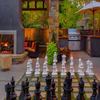 Is the outdoor chess set equipped with durable pieces?